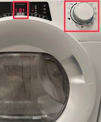 an image of a washing machine with a timer on it