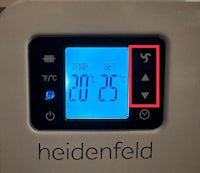 a heidenfeld thermostat with a clock on it