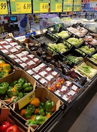 a display of vegetables in a grocery store