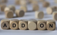 the word addon spelled out in wooden cubes