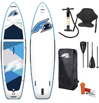 a stand up paddle board with a paddle and accessories