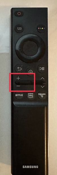 a samsung tv remote with a red circle on it